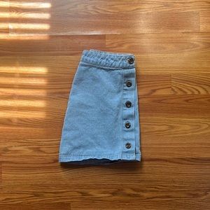 A mini denim skirt from forever 21 in the size small.